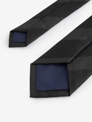 Next Slips i svart