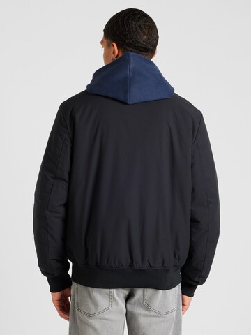 Champion Authentic Athletic Apparel Jacke 'Legacy' in Schwarz