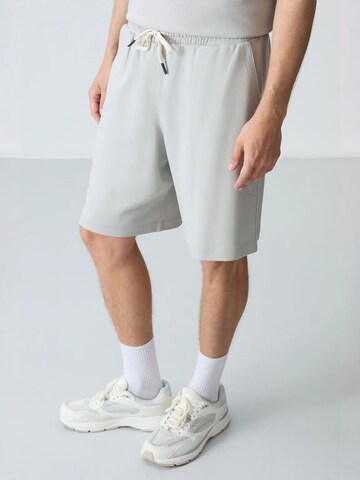 Tuta da jogging di Tommy Life in grigio