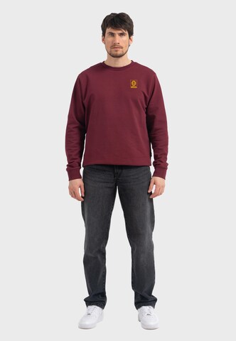 Oldskull Sweatshirt 'Wrldvibe Return to Wild Graphic' in Rood