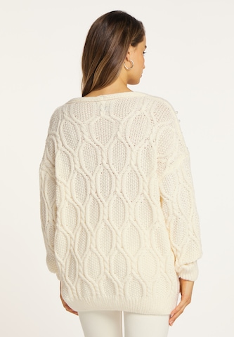 Pullover di faina in bianco