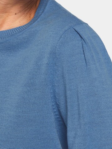 Goldner Pullover in Blau