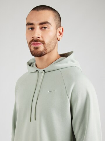 NIKE Спортивный свитшот 'PRIMARY' в Зеленый