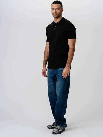 Coupe regular Chemise ' Muscle Polo ' TEESHOPPEN en noir