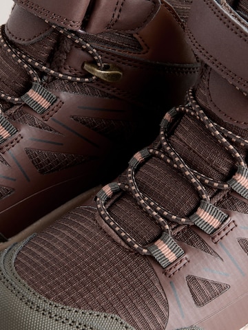 Bottes Next en marron