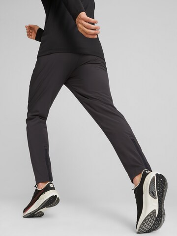 Effilé Pantalon de sport PUMA en noir