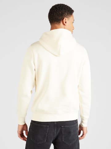 TOMMY HILFIGER Sweatshirt 'ARCHED VARSITY' in Beige