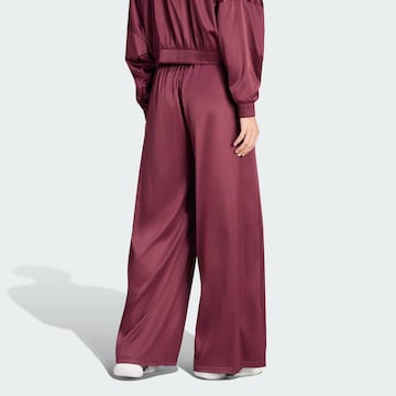 ADIDAS PERFORMANCE - Pierna ancha Pantalón deportivo en rojo