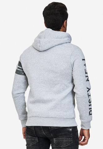 Rusty Neal Zip-Up Hoodie in Grey