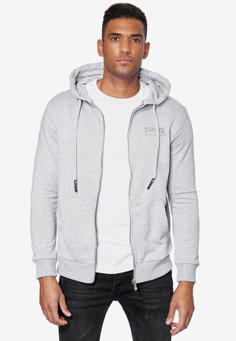 Rusty Neal Zip-Up Hoodie in Grey: front