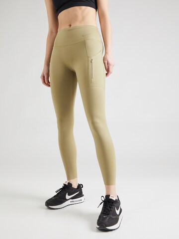 NIKE Skinny Workout Pants in Green: front