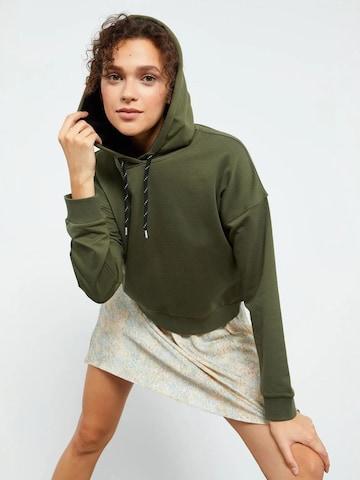 Sweat-shirt Tommy Life en vert : devant