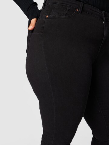 ONLY Carmakoma Skinny Jeans in Schwarz