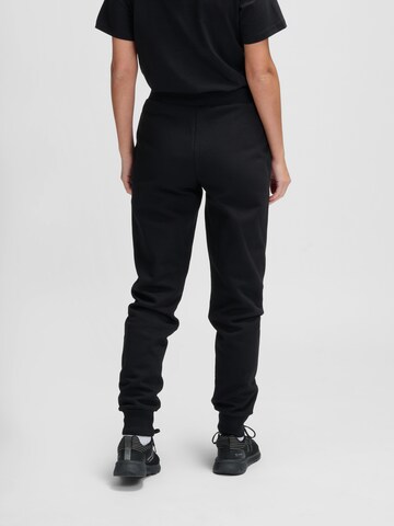 Effilé Pantalon de sport 'PAOLA' Hummel en noir