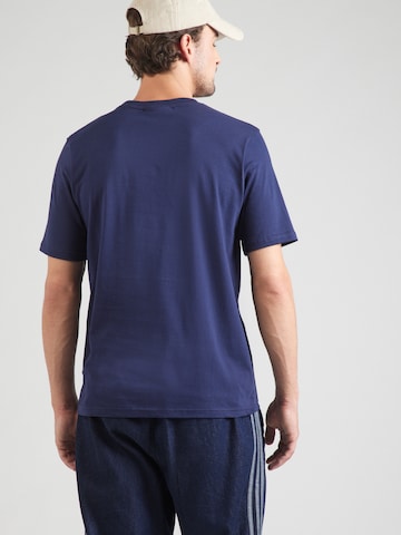 Sergio Tacchini Μπλουζάκι σε μπλε: πίσω