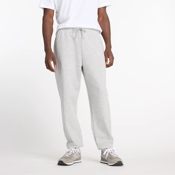Pantalon new balance en gris : devant