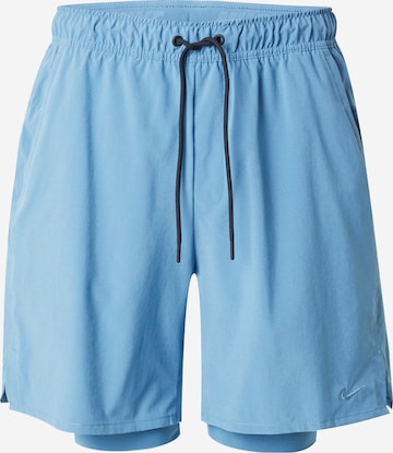 Pantalon de sport 'UNLIMITED' NIKE en bleu : devant