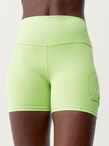 Born Living Yoga Skinny Sportbroek 'Volea' in Groen: voorkant