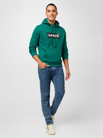 LEVI'S ® Sweatshirt 'Standard Graphic Hoodie' in Grün