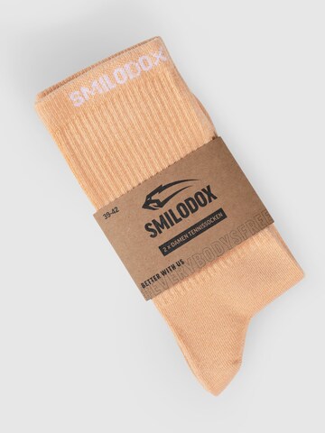 Chaussettes de sport Smilodox en orange