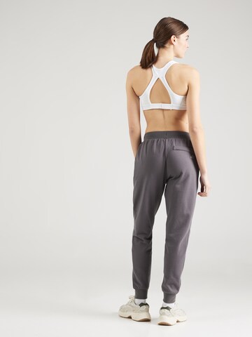 Tapered Pantaloni sportivi 'Chill' di BIDI BADU in grigio