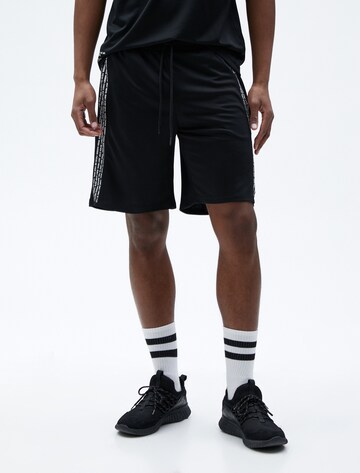 Koton Regular Pants in Black: front