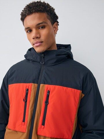 Next - Chaqueta funcional 'ThermoGen' en azul