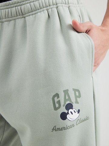 zils GAP Pakapēniski sašaurināts piegriezums Bikses 'DISNEY X GAP'