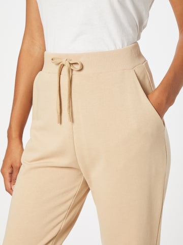 ABOUT YOU Limited - Tapered Pantalón 'Suzi' en beige