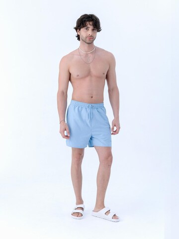 Rockupy Board Shorts 'Cem' in Blue: front