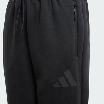 ADIDAS SPORTSWEAR Tapered Sports trousers 'Z.N.E.' in Black