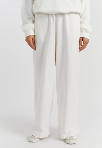 Chinti & Parker - Pierna ancha Pantalón en beige: frente