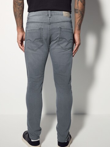 Next Slimfit Jeans i grå