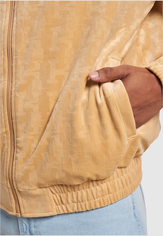 Veste mi-saison Karl Kani en beige