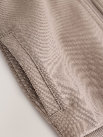 Set Next en marron