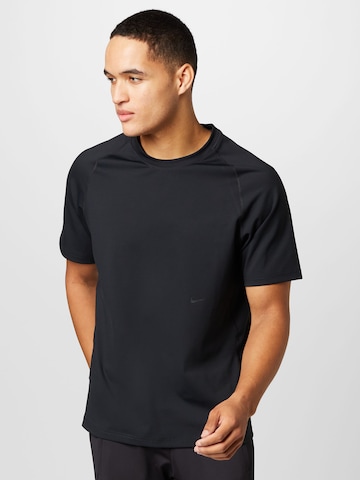 T-Shirt fonctionnel 'Axis' NIKE en noir : devant