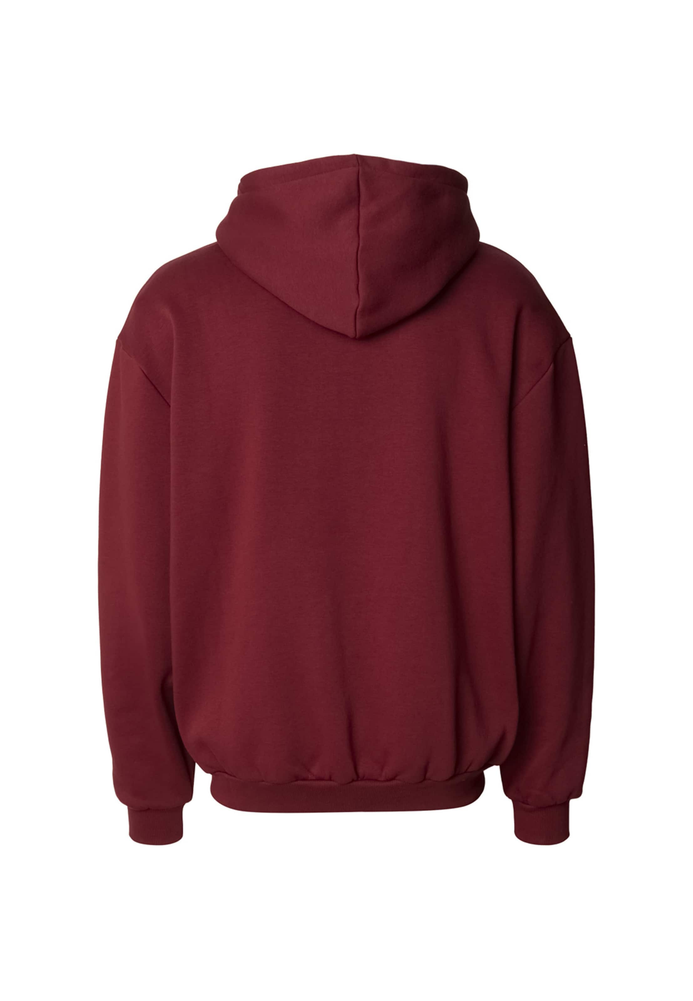 Veste de survêtement 'Essential' Karl Kani en rouge