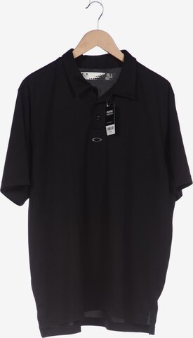 OAKLEY Poloshirt XL in Schwarz: predná strana