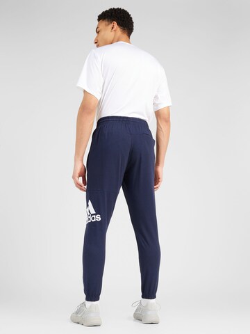 ADIDAS SPORTSWEAR Ozke Športne hlače 'ESS' | modra barva