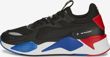 PUMA Athletic Shoes in Black: front