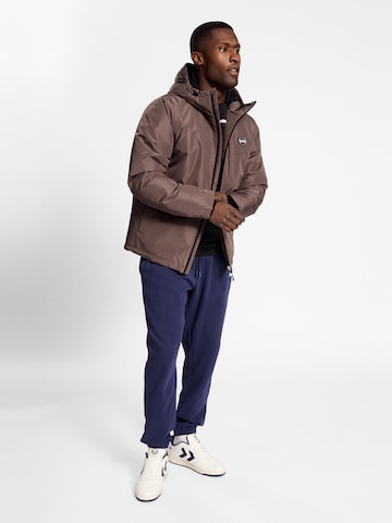 Hummel Athletic Jacket 'LGC HENRY' in Brown