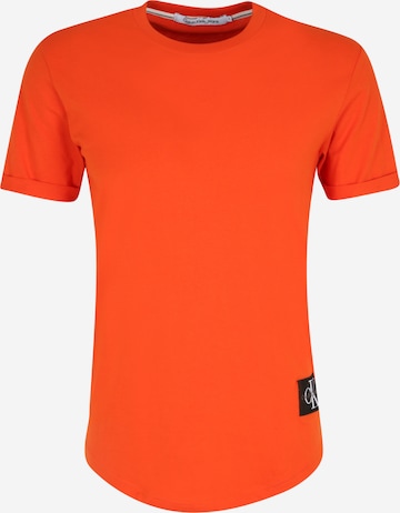 Calvin Klein Jeans - Camiseta en naranja: frente