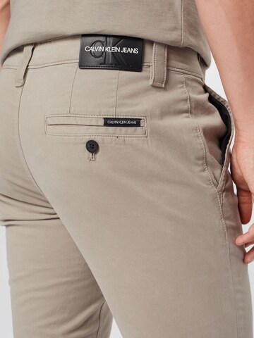 Calvin Klein JeansSkinny Chino hlače - bež boja