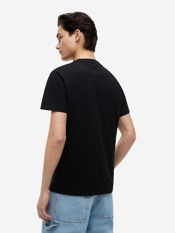 Maglietta 'DM0DM23376' di Tommy Jeans in nero