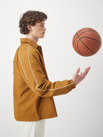 ADIDAS ORIGINALS Övergångsjacka i brun