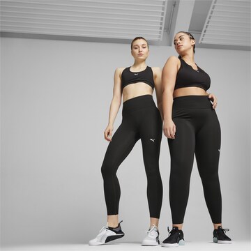 PUMA Skinny Sportbroek in Zwart