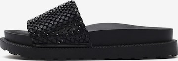 Derimod Mules in Black: front