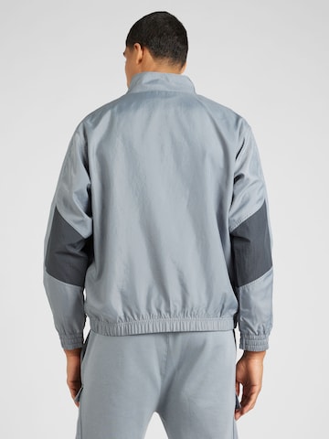 Nike Sportswear Φθινοπωρινό και ανοιξιάτικο μπουφάν 'AIR' σε γκρι