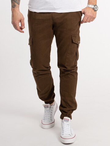 Rock Creek Tapered Cargo Pants in Brown: front