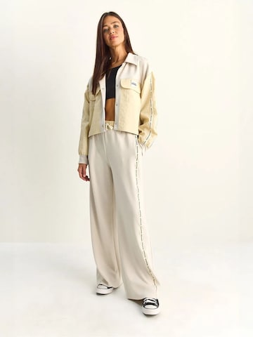Pantalons de tailleur Bianco Lucci en beige